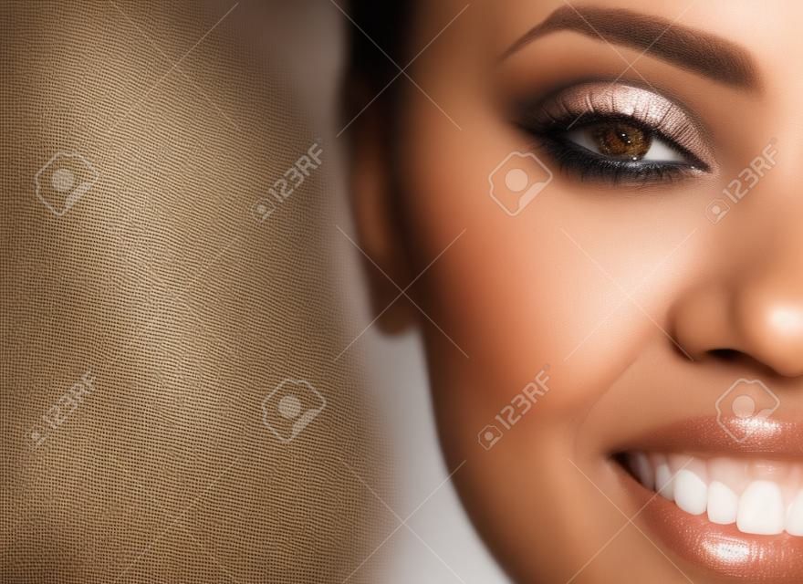 Closeup, black woman and cosmetics with portrait, natural beauty or dermatology with confident lady. Zoom, African American female or lady with happiness, makeup or morning routine for skin treatment