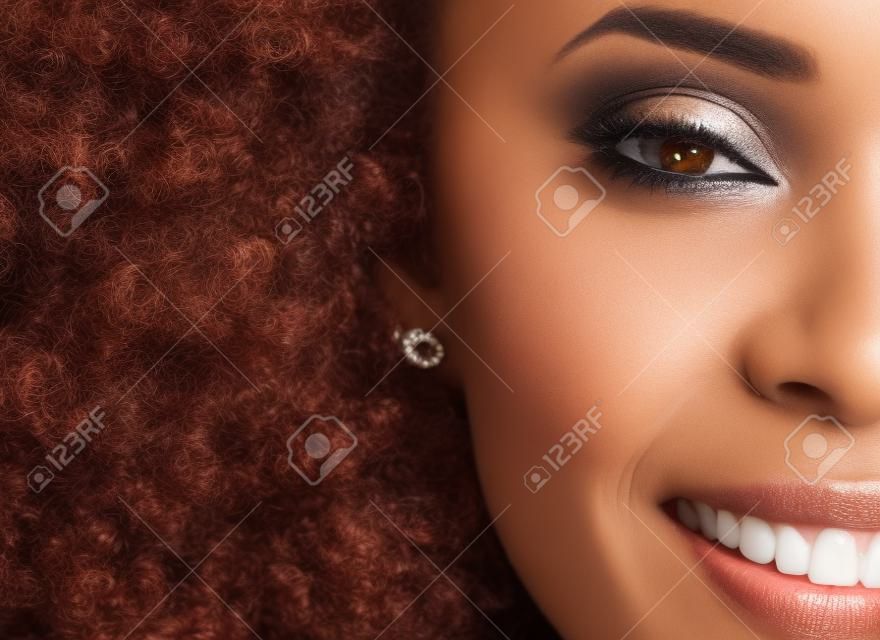 Closeup, black woman and cosmetics with portrait, natural beauty or dermatology with confident lady. Zoom, African American female or lady with happiness, makeup or morning routine for skin treatment