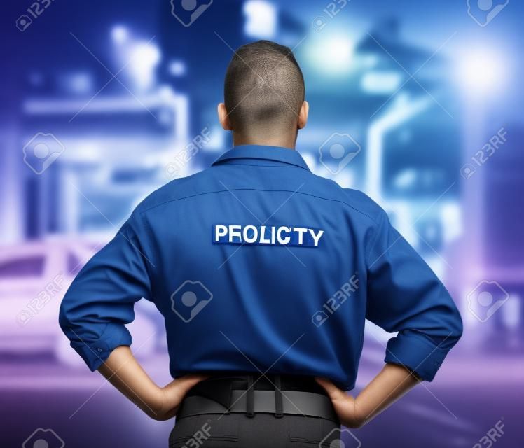 Man, back and security guard in city for safety protection, law enforcement or outdoor emergency. Rear view of male person, police or officer standing ready for crime control to protect and serve
