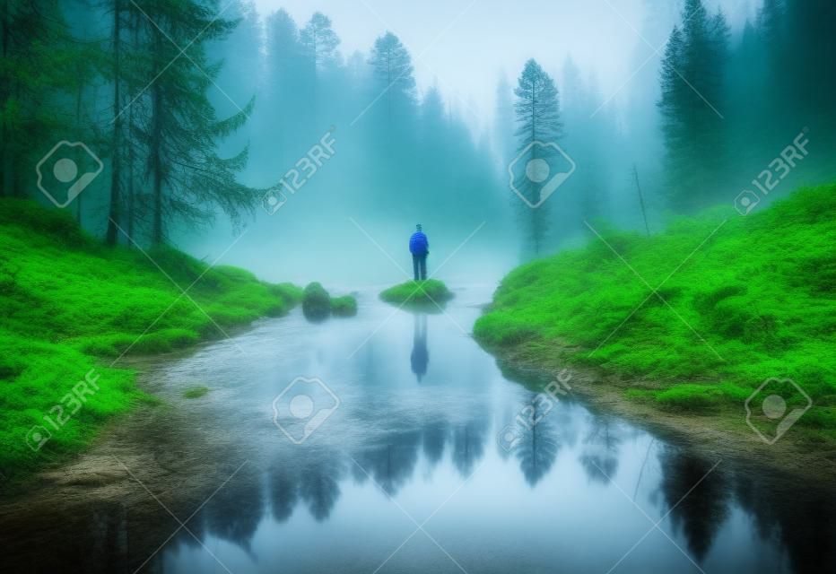 Back, person and hiking by forest river with mist, fog and water in ai generated hiker woods
