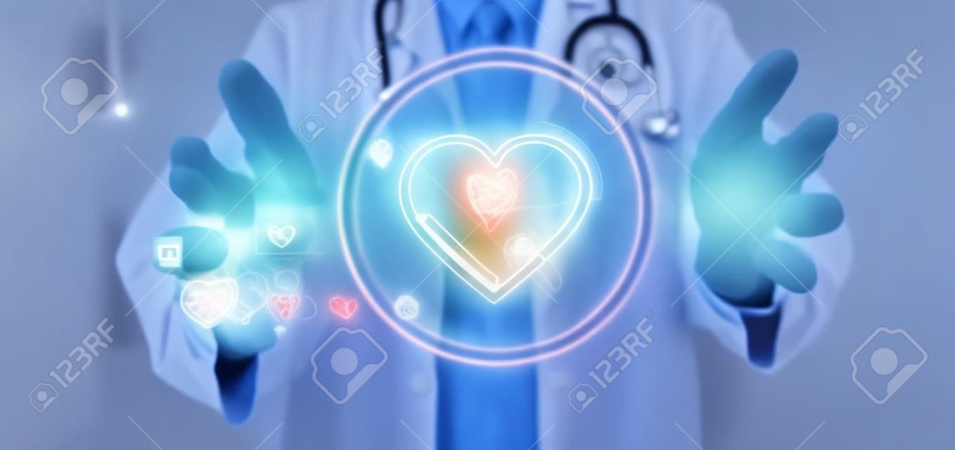 View of a Doctor holding a heart icon surrounded by data