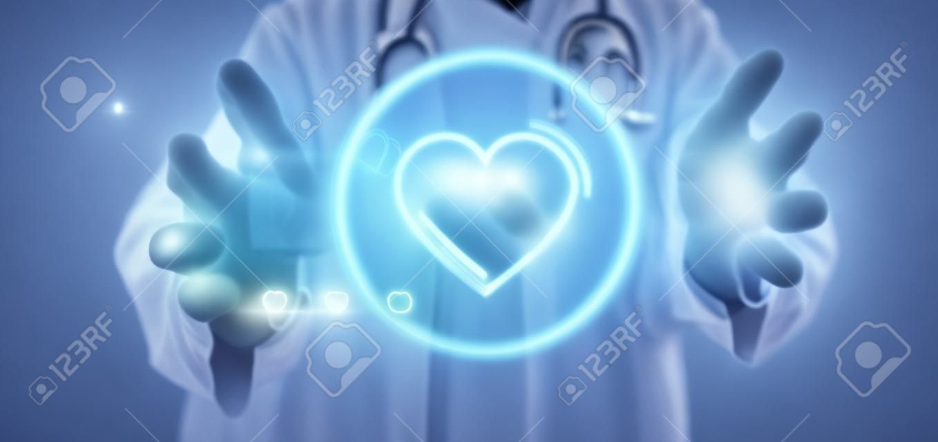 View of a Doctor holding a heart icon surrounded by data