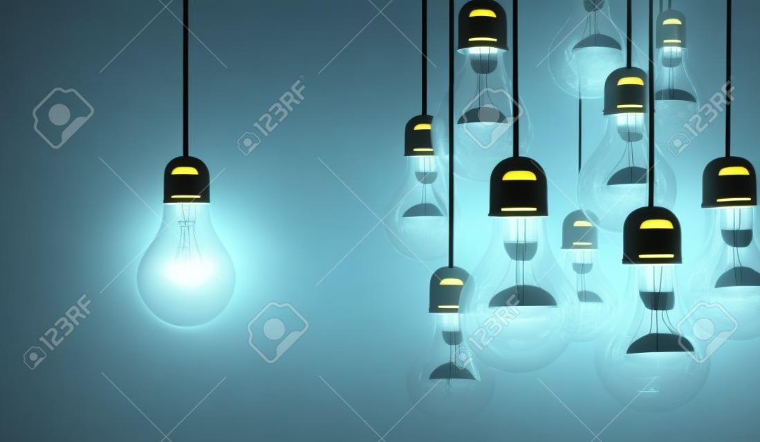 lampes suspendues au fil et une s'allume. Concept d'idée d'entreprise. rendu 3d