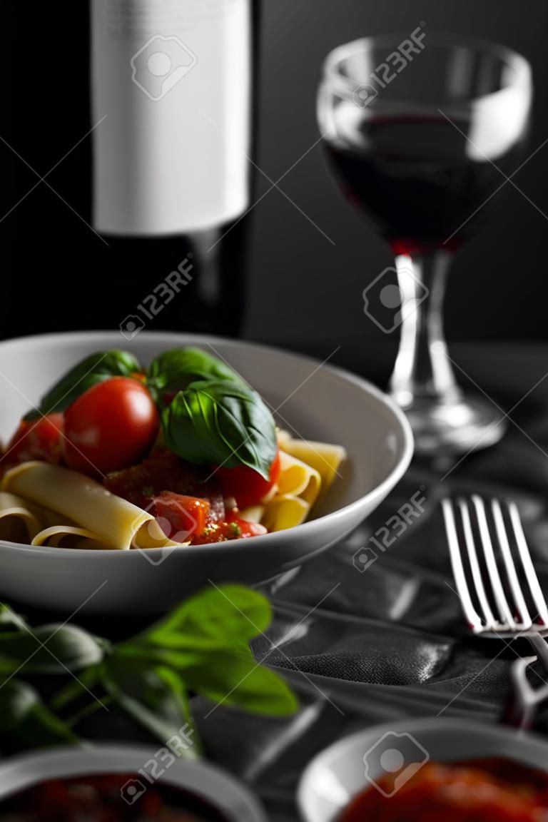Semolina pasta with spicy tomato salsa, garlic and basil,