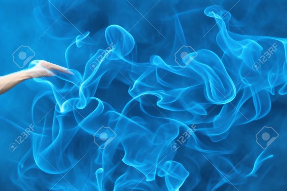 Blue smoke movement on white background.