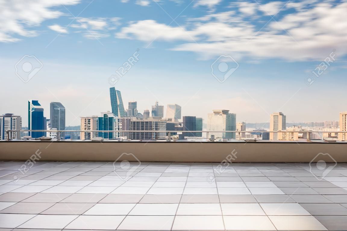 empty roof top balcony with cityscape background