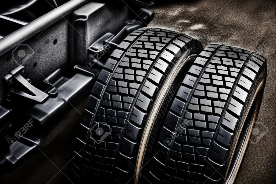 closeup Truck Tire, black rubber pickup wheel clean new shiny car tyre for background
