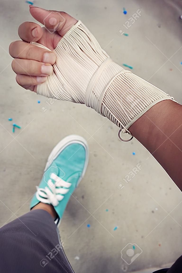 Selfie of bandage hand with shoes