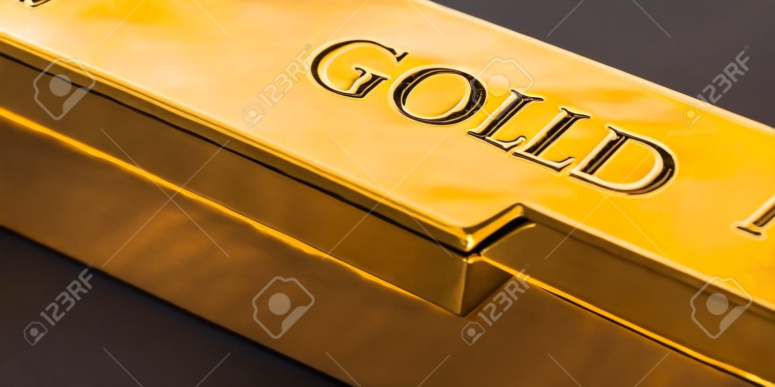 gold bar close-up on a black background