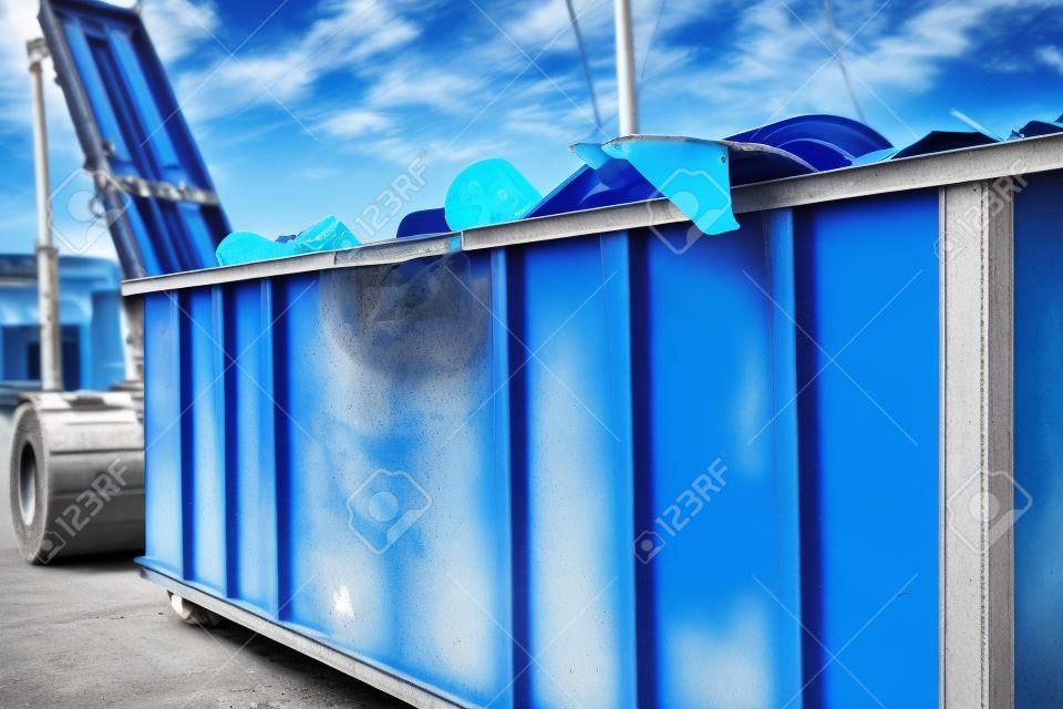 Blu dumpster, recycle waste recycling container trash on ecology and environment Selective focus