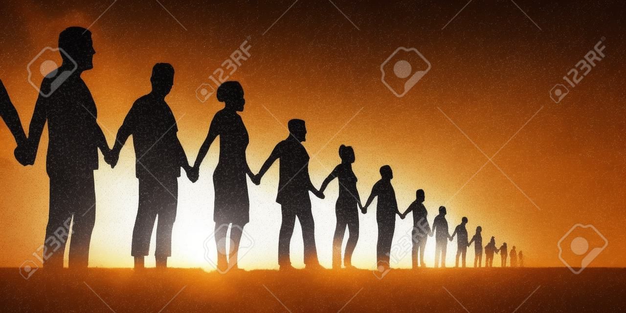 Conceito de cadeia humana e solidariedade com um grupo de pessoas alinhadas que dão as mãos para mostrar que há força na unidade.