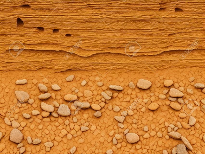 Banded modello texture di sfondo di sedimenti depositati in strati geologici costituiti da sabbia, limo e ghiaia
