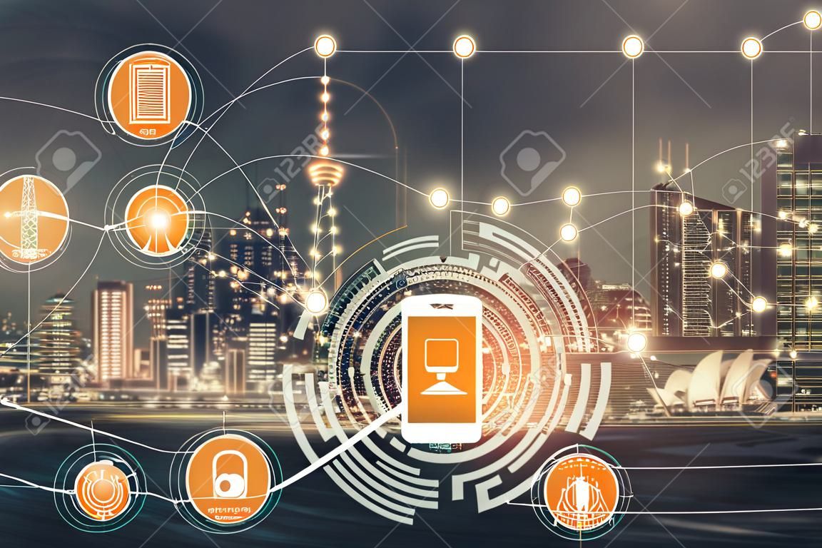Smart city wireless communication network with graphic showing concept of internet of things ( IOT ) and information communication technology ( ICT ) against modern city buildings in the background.