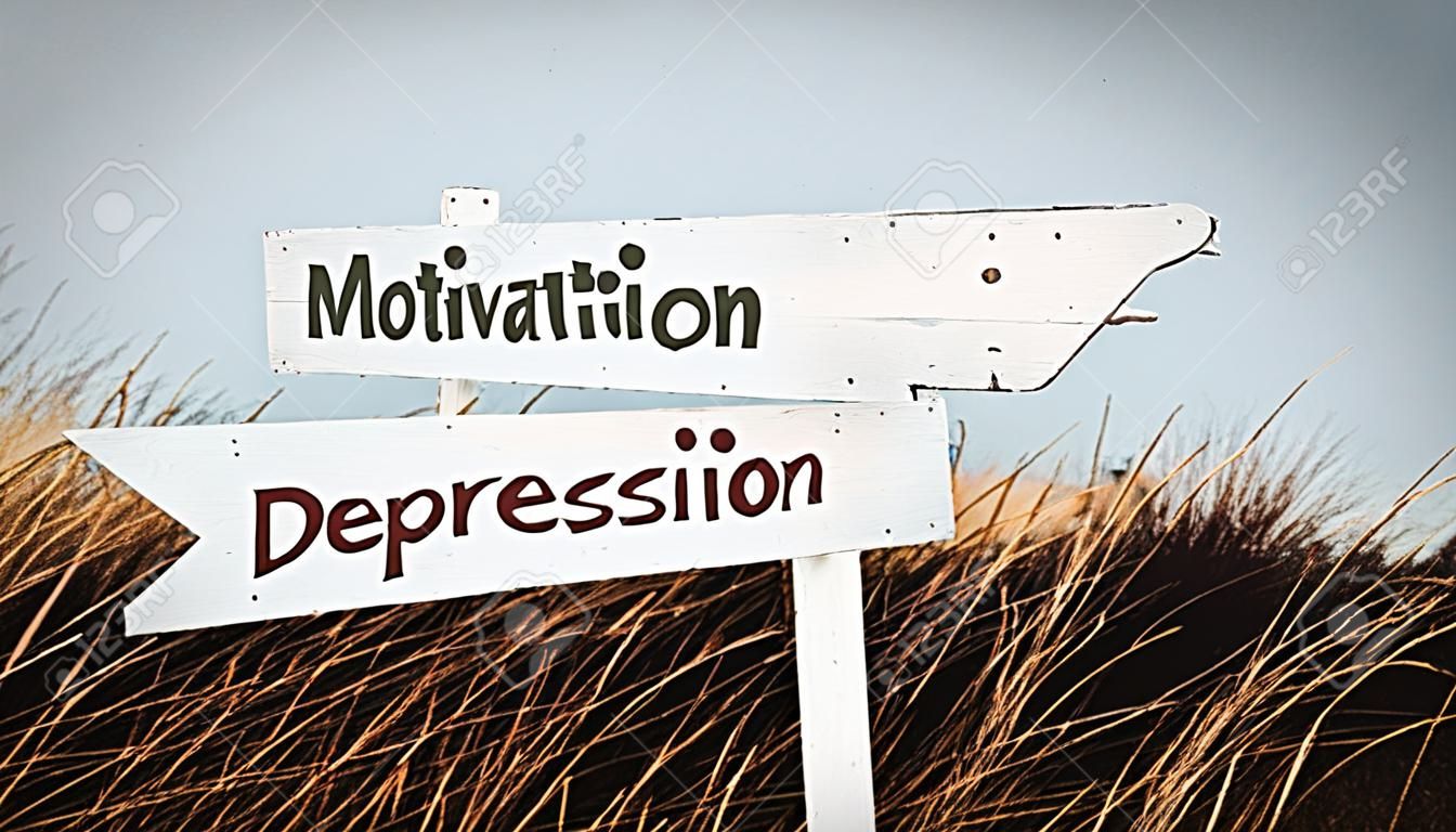 Cartello stradale la direzione verso la motivazione contro la depressione