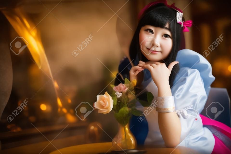 portrait of girl with japanese maid costume in vintage restaurant
