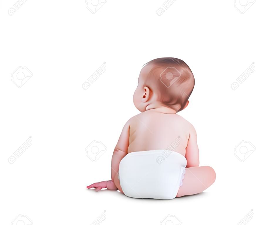 Baby toddler sitting facing backwards isolated on a white background