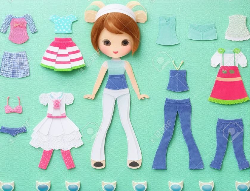 Paper doll with set of clothes.
