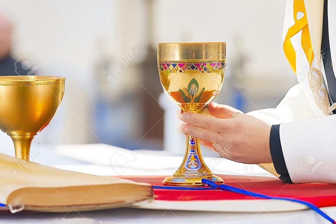 in the church wine becomes the blood of christ, and the host becomes the body of christ