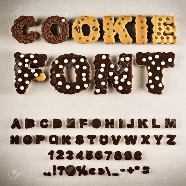 クッキーフォント。チョコレートドロップアルファベットのビスケット。クッキーの手紙食品レタリング。食用タイポグラフィ。ベーキングABC。クラッカーとオートミールペストリー