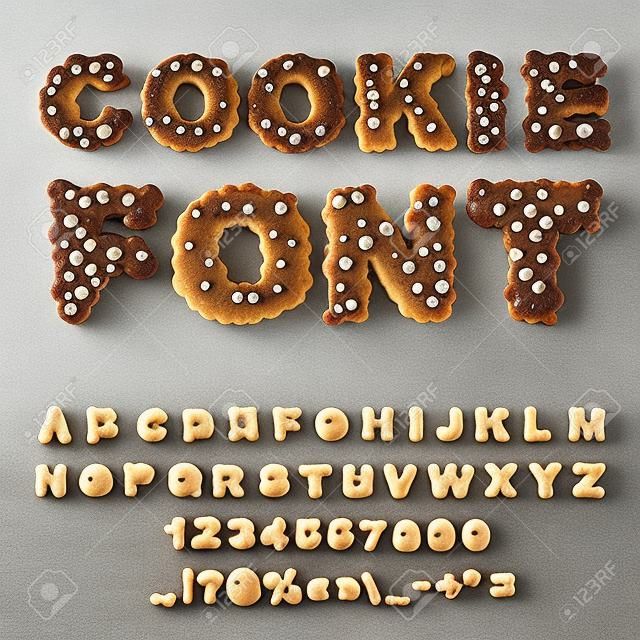 Cookies字体。饼干巧克力滴字母表。 Cookie的字母。食品刻字。食用版式。烘焙ABC。饼干和燕麦糕点