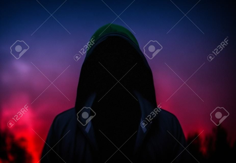 Silhouette of man in the hood