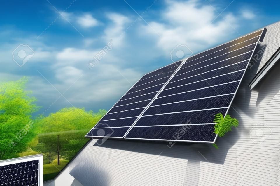 Large solar panels on rooftop of modern comfortable house or cottage