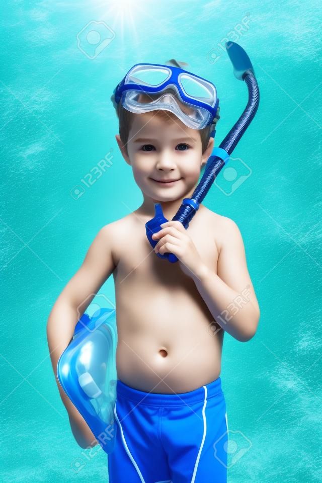 Little boy in scuba mask and snorkel. Isolated over white.