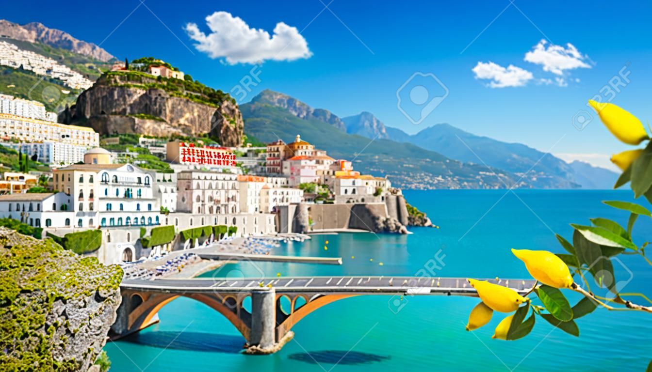 Beautiful view of Amalfi on the Mediterranean coast with lemons in the foreground, Italy