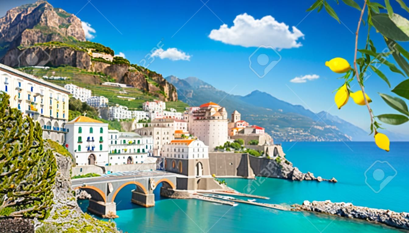 Beautiful view of Amalfi on the Mediterranean coast with lemons in the foreground, Italy