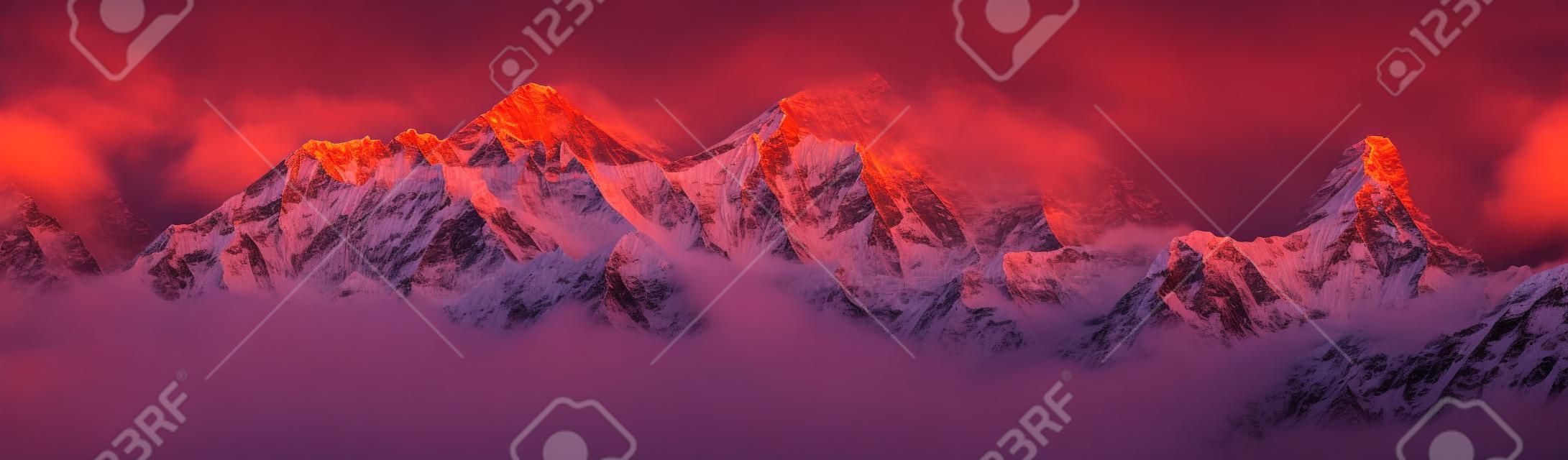 Evening sunset red colored view of mount Everest, Lhotse and Ama Dablam from Kongde village, Khumbu valley, Solukhumbu, Nepal Himalayas mountains