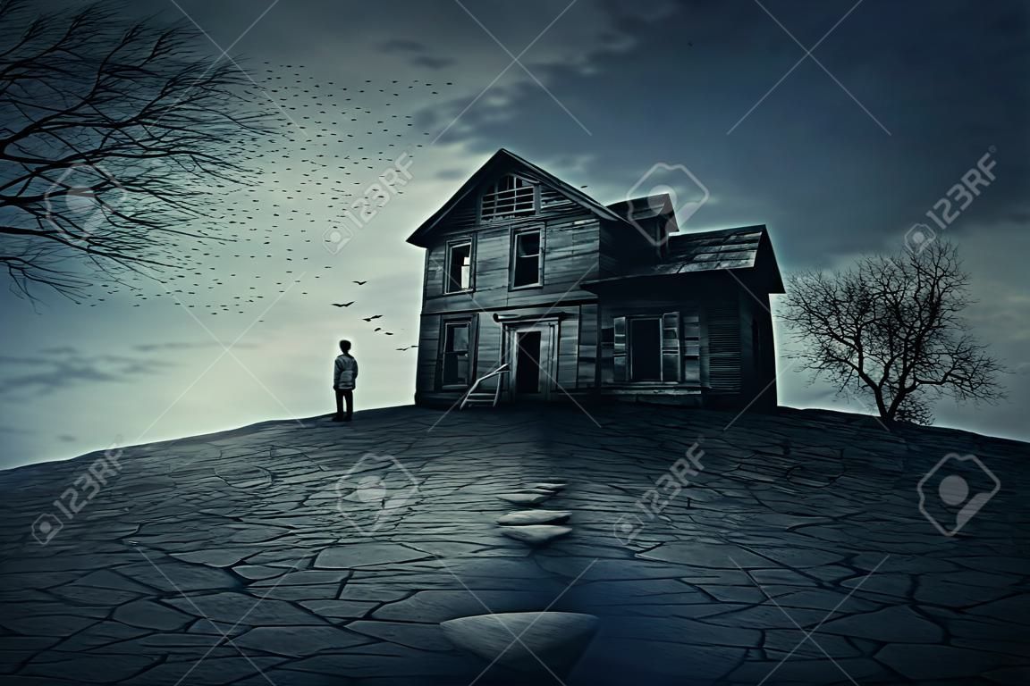 Młody mężczyzna stoją na rogu zniszczonym domu, patrząc daleko na kogoś. Duch, opuszczone dom z suchej ziemi i drzewa.
