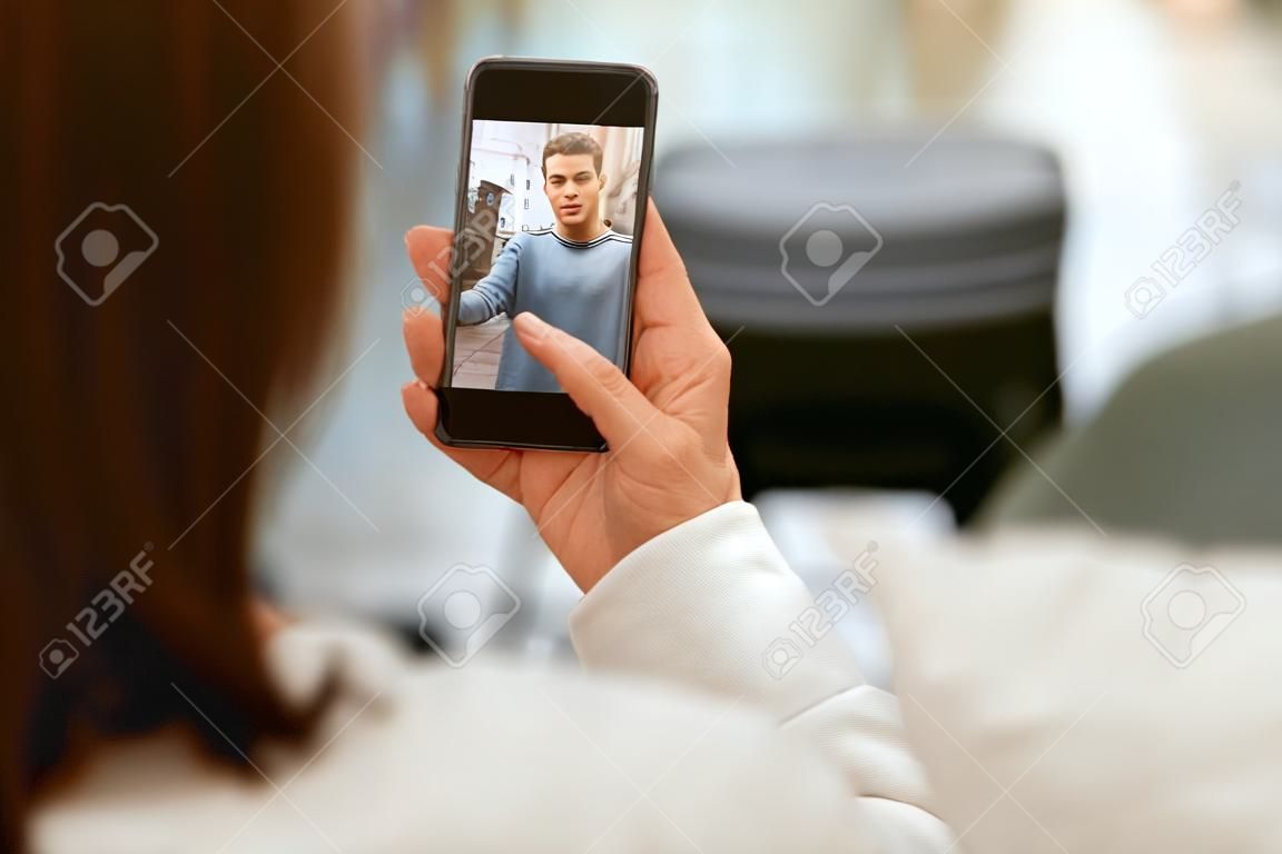 Video Call On Phone. Close Up Hand With Phone And Face On Screen. Woman  Calling Man Via Online Video Chat. High Resolution Фотография, картинки,  изображения и сток-фотография без роялти. Image 108329342