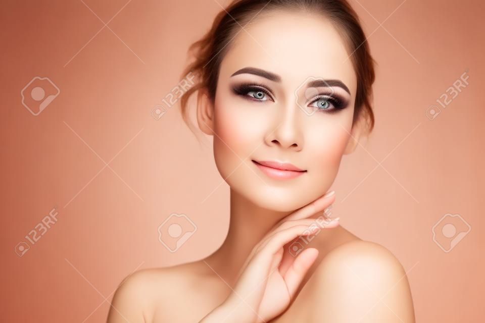 Beauty face. Woman with natural makeup and healthy skin portrait