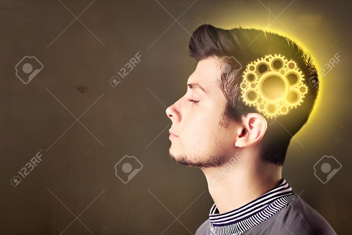 Persona joven que piensa con una ilustración de la cabeza de la máquina que brilla intensamente