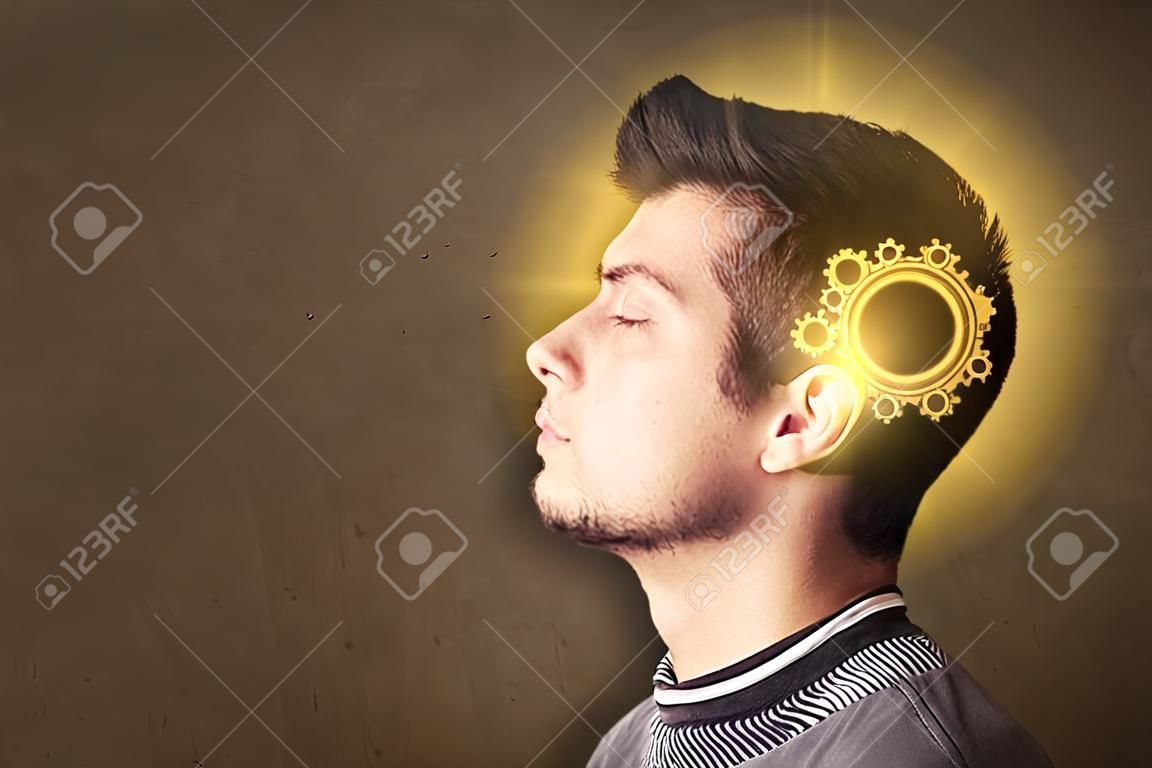 Persona joven que piensa con una ilustración de la cabeza de la máquina que brilla intensamente