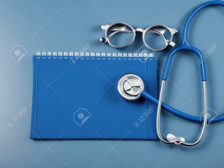 close up stethoscopes for doctor working or education with copy spaceon desk table