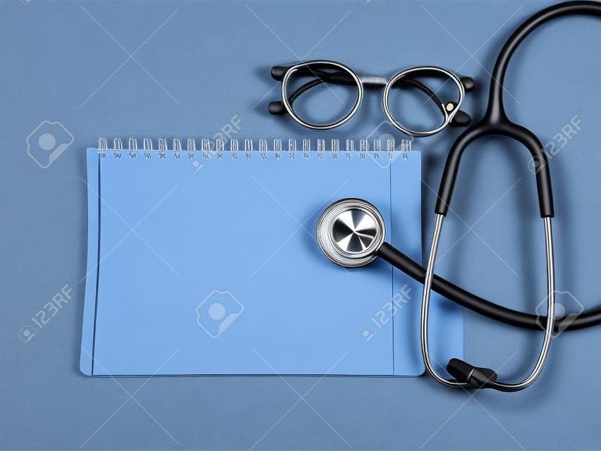 close up stethoscopes for doctor working or education with copy spaceon desk table