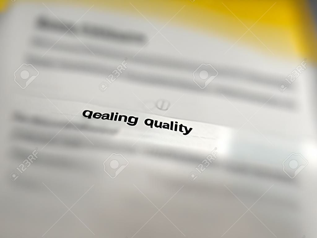 Blurry text and close up or focus or highlighting the word of quality, texture pattern background