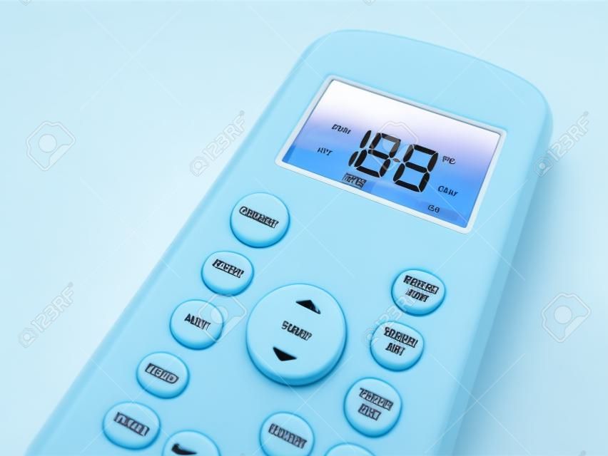Affichage d'une télécommande de climatiseur avec température réglée à 26 degrés