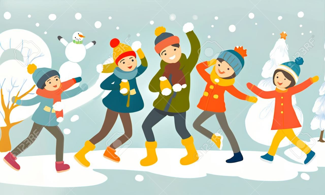 Young happy family playing snowball fight and having fun in snow in winter.