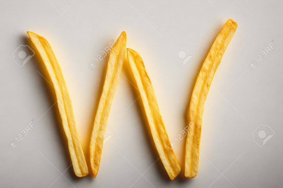 alphabet letter from French fries on the white