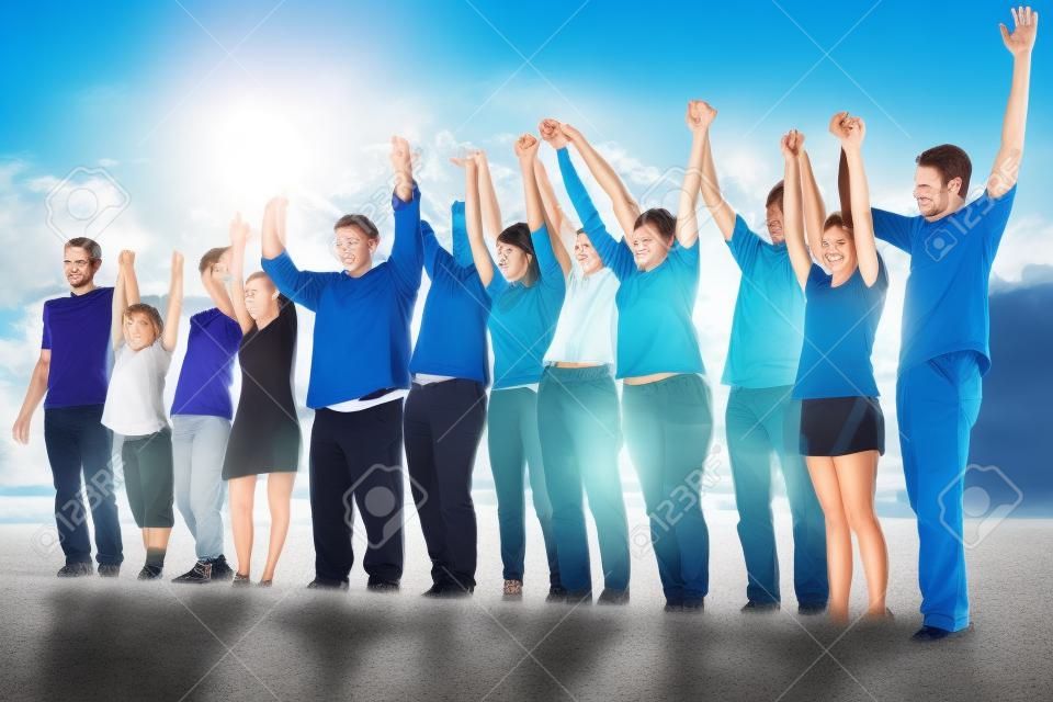 Group of people holding handssupport team unity