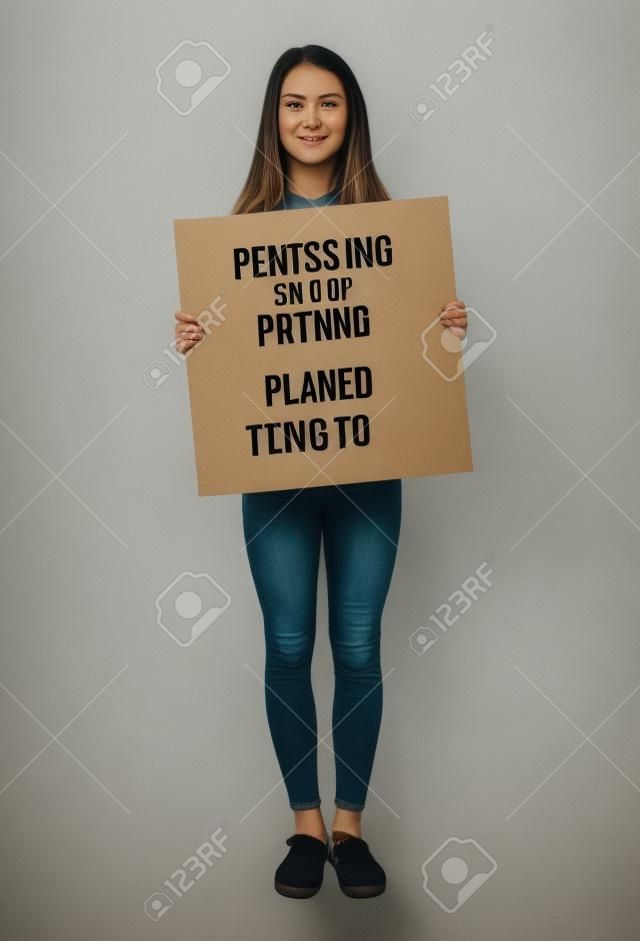 Person Standing and Holding empty Placard