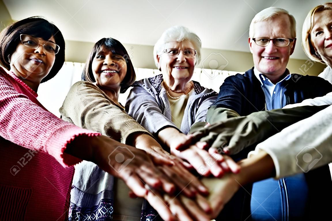 Group of senior friends support concept