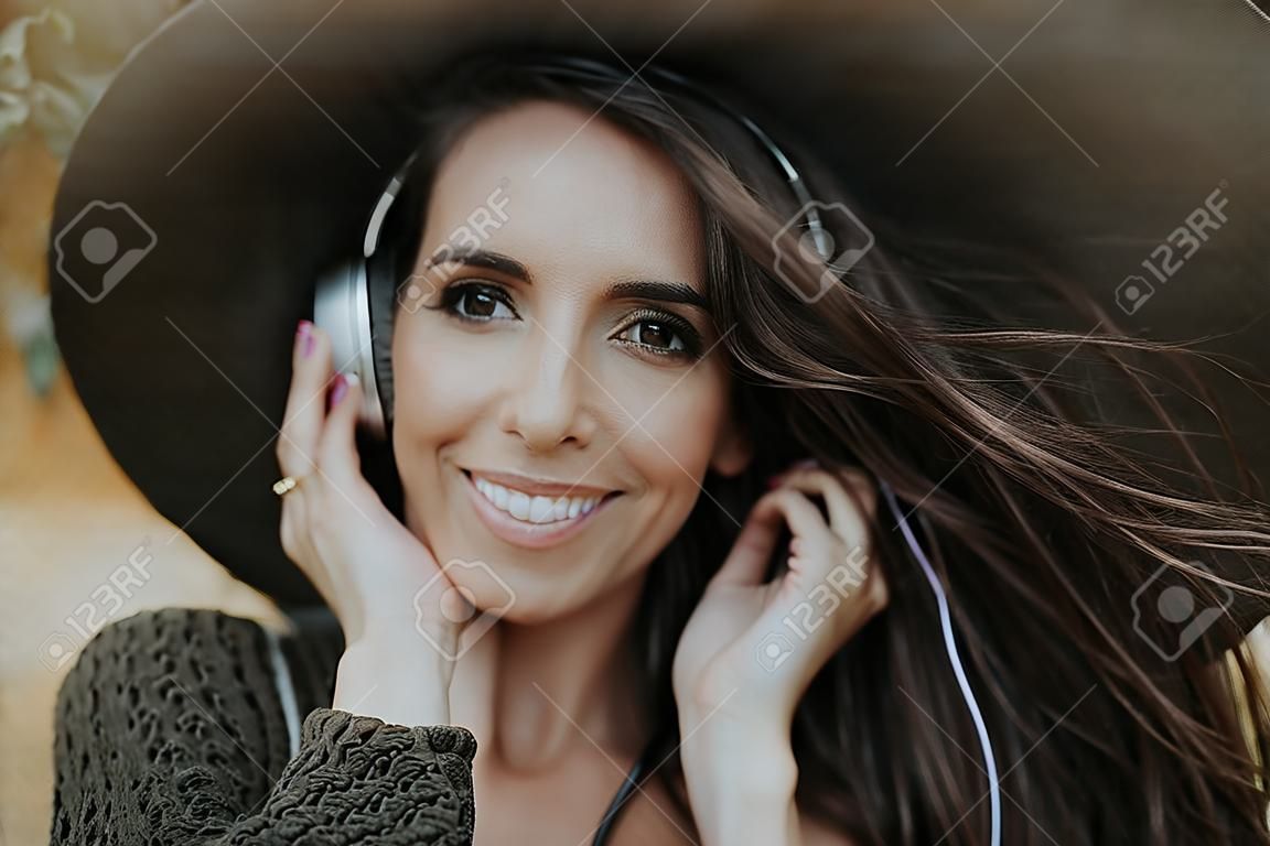 Brunette woman listening to music