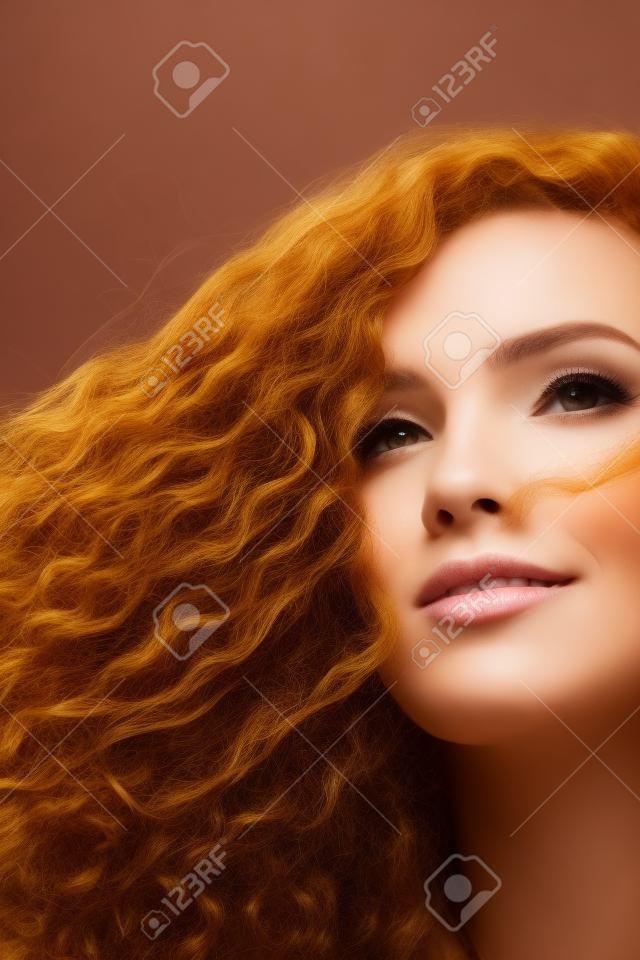 Portrait of a beautiful woman with curly hair