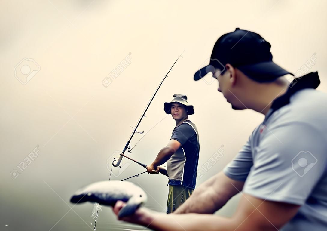 Men fishing at the lake