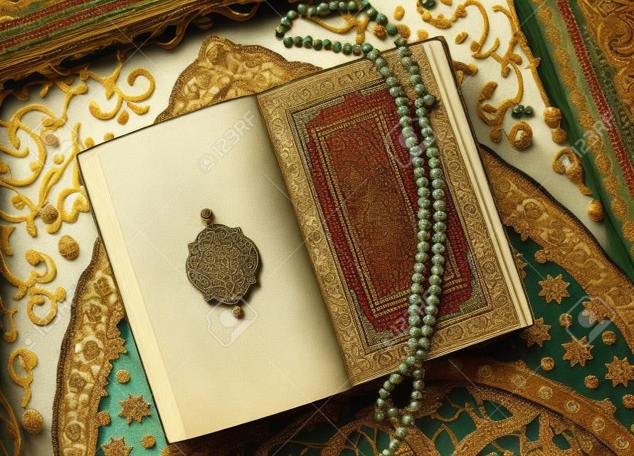 Beads on top of a Quran