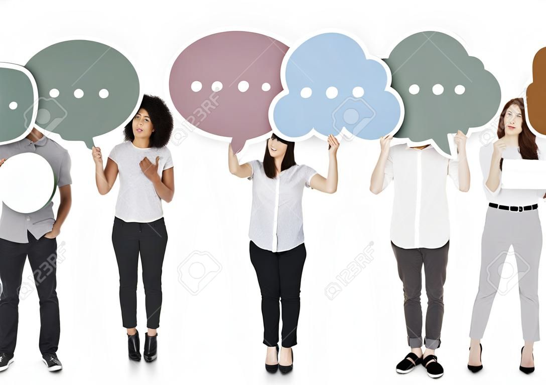Diverse people holding speech bubble symbols