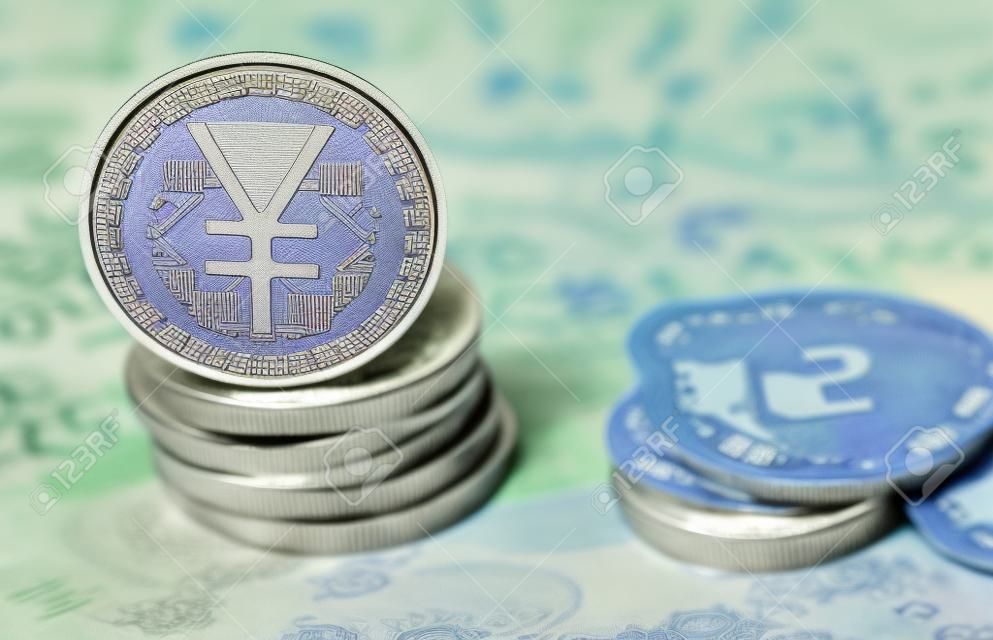 Chinese digital currency, conceptual image of the digital Yuan, or e-RMB, on old yuan banknotes